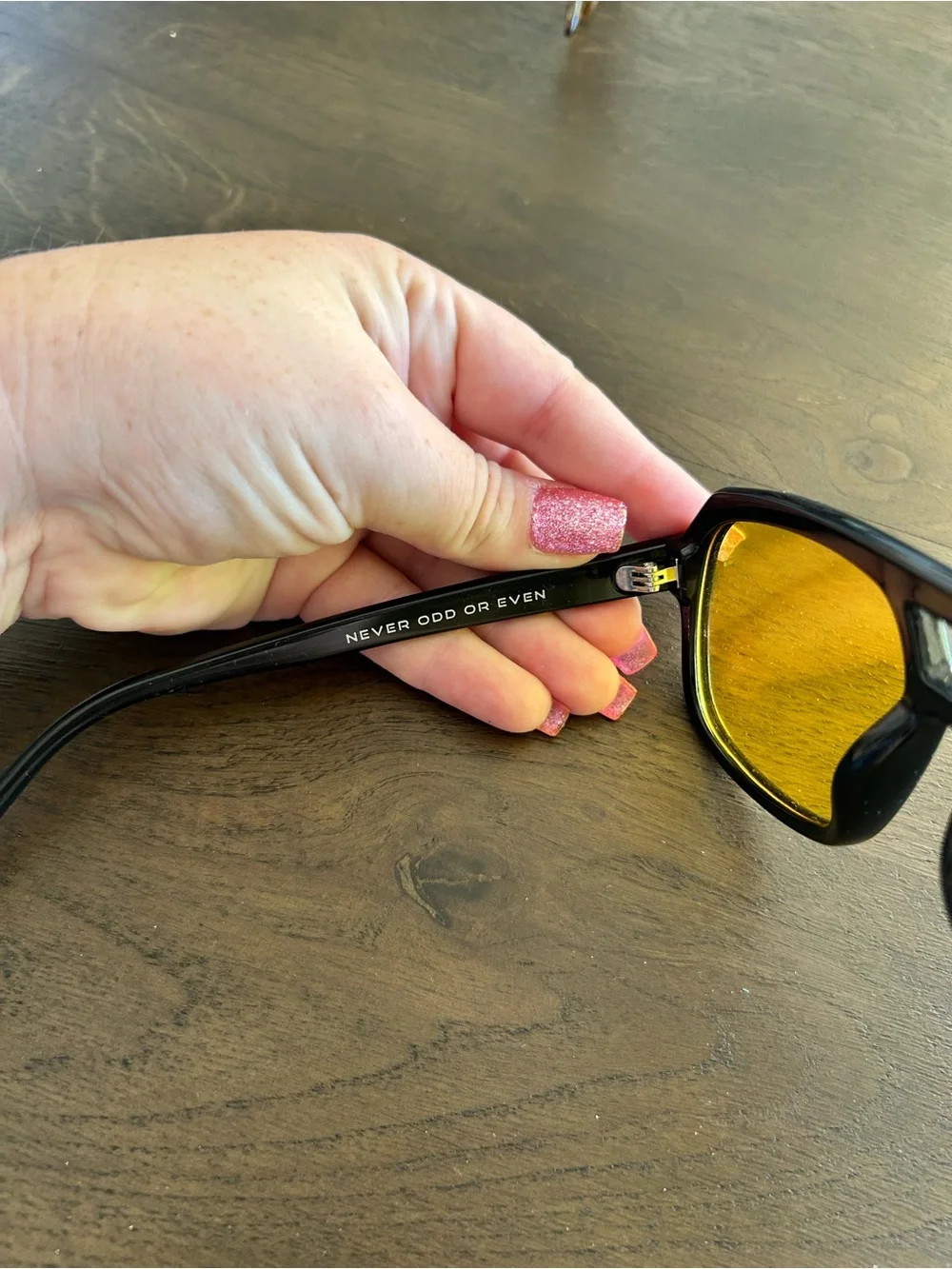 Neven Helios sunglasses yellow lens black frame polarized